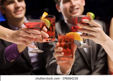 Young Attractive People Of Four Having Cocktail Party