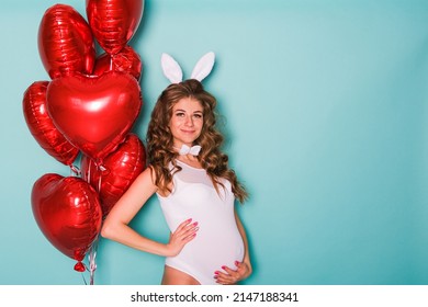 Young Attractive Pregnant Girl In A Bunny Suit