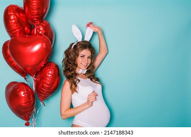 Young Attractive Pregnant Girl In A Bunny Suit