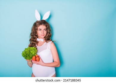 Young Attractive Pregnant Girl In A Bunny Suit