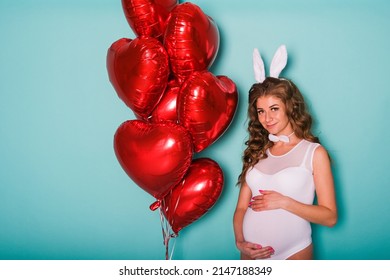 Young Attractive Pregnant Girl In A Bunny Suit