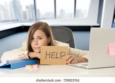 Young Attractive Sad And Desperate Business Woman Suffering Stress At Office Laptop Computer Desk Holding Help Sign Looking Depressed And Overwhelmed In Business Crisis And Problem Concept