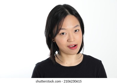 Young Attractive South East Asian Woman Pose Face Expression Emotion On White Background Smile Witty