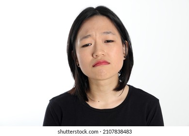 Young Attractive South East Asian Woman Pose Face Expression Emotion On White Background Think Worry Sad