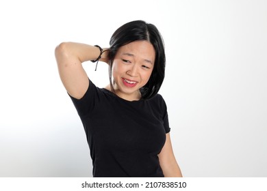 Young Attractive South East Asian Woman Pose Face Expression Emotion On White Background Hand In Hair