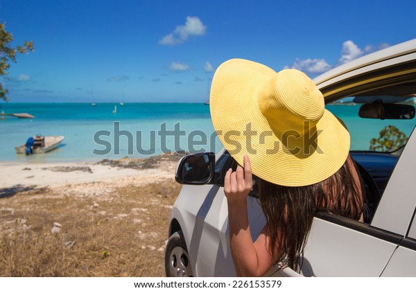 Young attractive woman in the\
car
