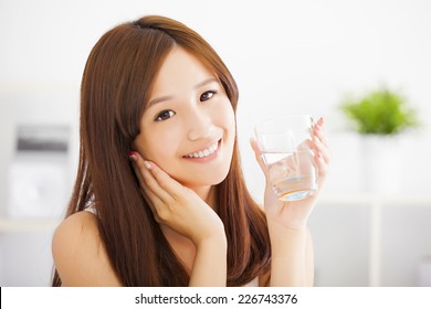 Young Attractive Woman With Clean Water