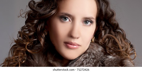 young attractive woman with curly hair