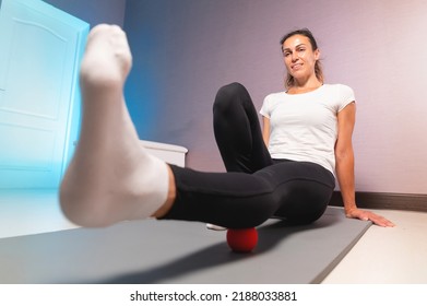 Young Attractive Woman Doing Exercises, Wide Angle View From Below, Indoor Workout At Home