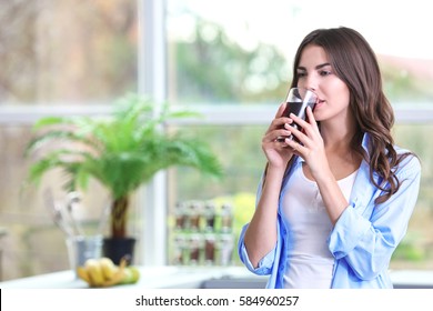 Young Attractive Woman Drinking Cherry Juice