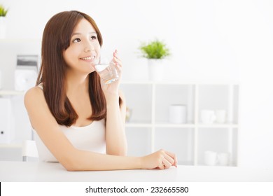 Young Attractive Woman Drinking Clean Water