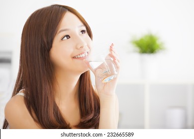 Young Attractive Woman Drinking Clean Water