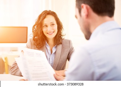 Young attractive woman during job interview - Shutterstock ID 373089328