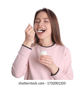 Young Attractive Woman Eating Tasty Yogurt On White Background