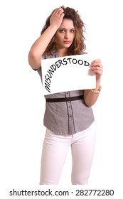 Young Attractive Woman Holding Paper With Misunderstood Text On White Background