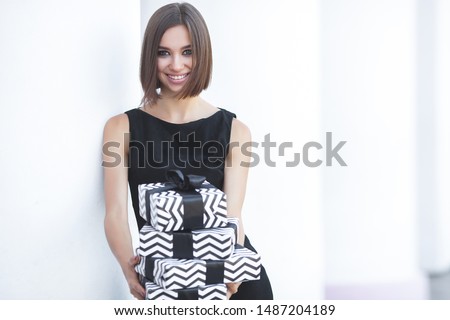 Similar – young beautiful lady posing in the living room next to a window