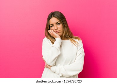 Young authentic charismatic real people woman against a wall who is bored, fatigued and need a relax day. - Shutterstock ID 1554728723