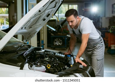 Young Auto Mechanic Examining Engine Workshop Stock Photo 1511345051 ...