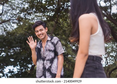 A Young Awkward Man Saying Hi To His Crush. Attracted To A Woman Outside The Park. Being Shy About His Personality And Looks.