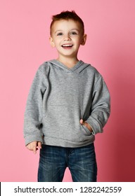 Young Baby Boy Kid In Grey Hoodie With Free Text Copy Space Happy Smiling On Pink Background