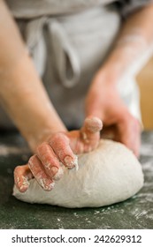 Young Baker Preparing Artisan Sourdough Bread.