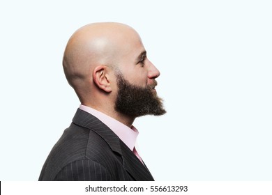 Young Bald Man With A Beard Wearing A Stylish Jacket, Side View