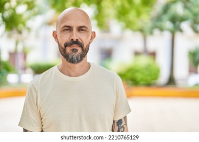 Young Bald Man Smiling Confident Standing At Park