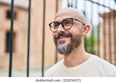 Young Bald Man Smiling Confident Wearing Glasses At Street