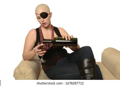 Young Bald Woman With An Eyepatch Pouring A Glass Of Wine. Stylized Off Beat Concept.