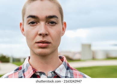 Young Bald Woman Looking At Camera Outdoor - Authentic And Real People Concept