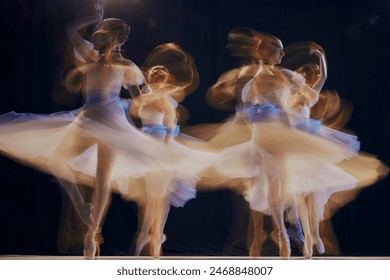 Young ballet ensemble in sheer dresses creating illusion of multiple movements against a dark background on stage. Concept of beauty, classic and modernity, contemporary art. Ad