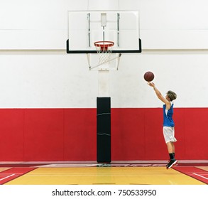 Young basketball player shoot