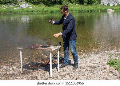 Young Bearded Guy, Hipster In A Jacket Overworked. And Burned The Office In A Fit Of Rage. Office Worker Decided To Quit Work, Because He Hates Office Work.