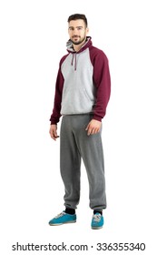 Young Bearded Male In Sport Casual Clothes Smiling Looking At Camera. Full Body Length Portrait Isolated Over White Studio Background. 