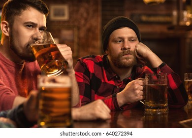 Young Bearded Man Looking Upset And Sad Having Beer At The Pub Copyspace Depression Stress Tired Exhausted Crisis Drinking Problems Issues Unhappy Disappointment Regret Sadness Loneliness Alcohol