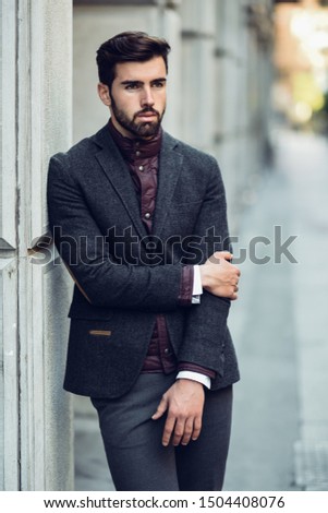 Similar – Guy with beard and modern hairstyle in the street.