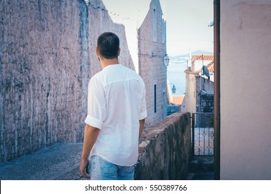 Young Bearded Man Walking In Dubrovnik Old Town, Croatia, Europe - Back Shot, From Behind, Anonymous, No Face