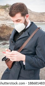 Young Bearded Man Wearing A Mask By The Sea