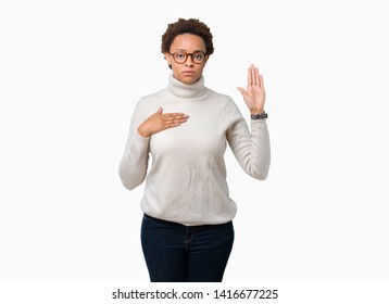 Young Beautiful African American Woman Wearing Glasses Over Isolated Background Swearing With Hand On Chest And Open Palm, Making A Loyalty Promise Oath