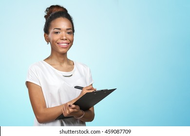 young beautiful african american woman with clipboard