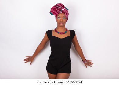 Young beautiful African woman wearing a traditional headscarf