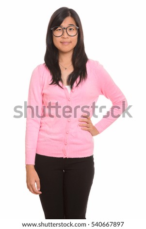 Young beautiful Asian nerd woman isolated against white background