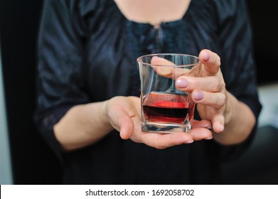 Young Beautiful Asian Sommelier Girl Drinking Glass Of Red Wine Over Isolated White Background Very Happy Pointing With Hand And Finger