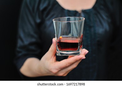 Young Beautiful Asian Sommelier Girl Drinking Glass Of Red Wine Over Isolated White Background Very Happy Pointing With Hand And Finger