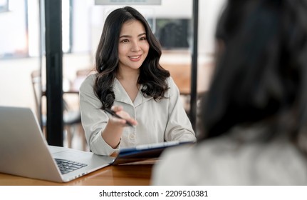 Young beautiful asian woman doing a job interview. - Shutterstock ID 2209510381