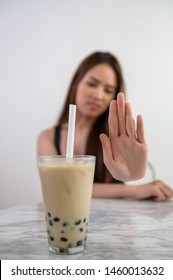 Young Beautiful Asian Woman During Dieting Course Rejecting To Drink Bubble Milk Tea Because Avoiding High Calories Food.