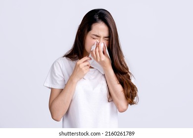 Young beautiful asian woman got sick and flu on white background. - Shutterstock ID 2160261789