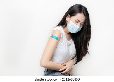 Young Beautiful Asian Woman Having Painful Stomach Ache. Vaccine Allergy Effect After Received Vaccine With Copy Space.