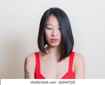 Young Beautiful Asian Woman Looking Down Portrait