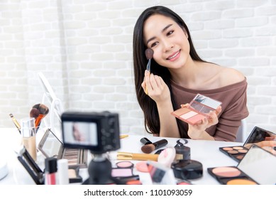 Young Beautiful Asian Woman Professional Beauty Vlogger Or Blogger Recording Make Up Tutorial To Share On Social Media